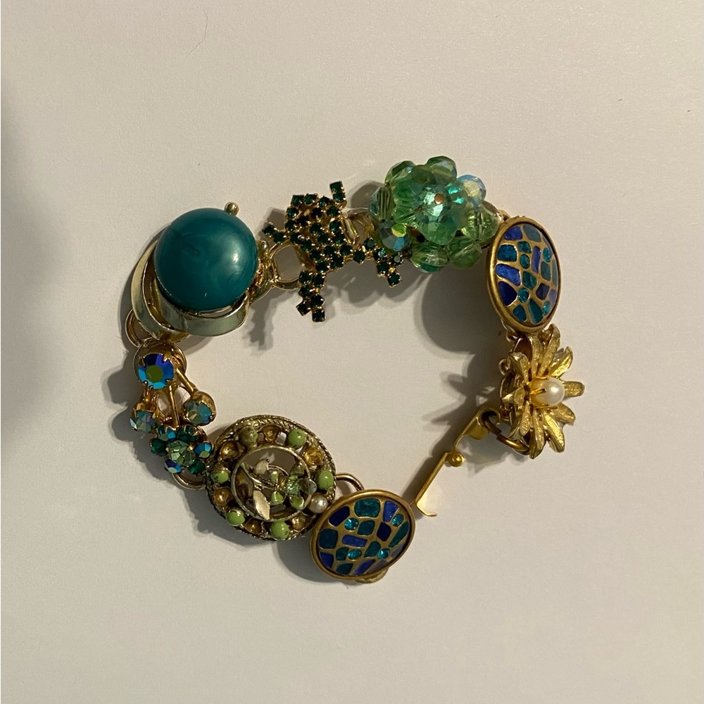 One of a Kind bracelet made with vintage/antique earrings and brooches!